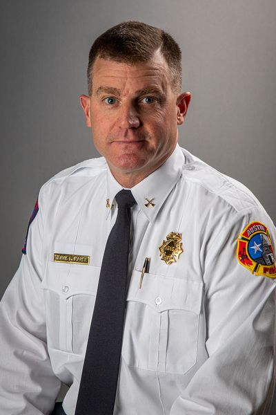Travis L. Maher